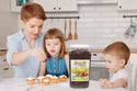 Mother and children pouring Organic Raw Cacao Nibs in the kitchen Organic Raw Cacao Nibs on muffins in the kitchen Organic Raw Cacao Nibs jar on the table by Anna and Sarah