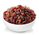 Natural Seedless Thompson Raisins in white bowl with white background by Anna and Sarah