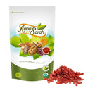 Organic Goji Berries on the white ground in resealable pack with some Goji Berries next to it  by Anna and Sarah