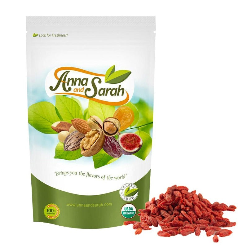 Organic Goji Berries on the white ground in resealable pack with some Goji Berries next to it  by Anna and Sarah